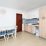 Den Διαμέρισμα